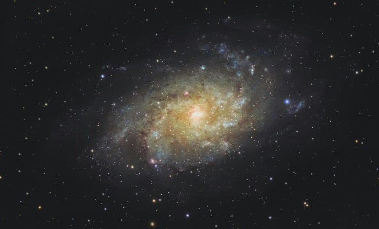 Astronomers found this massive galaxy cluster weighing over two ...