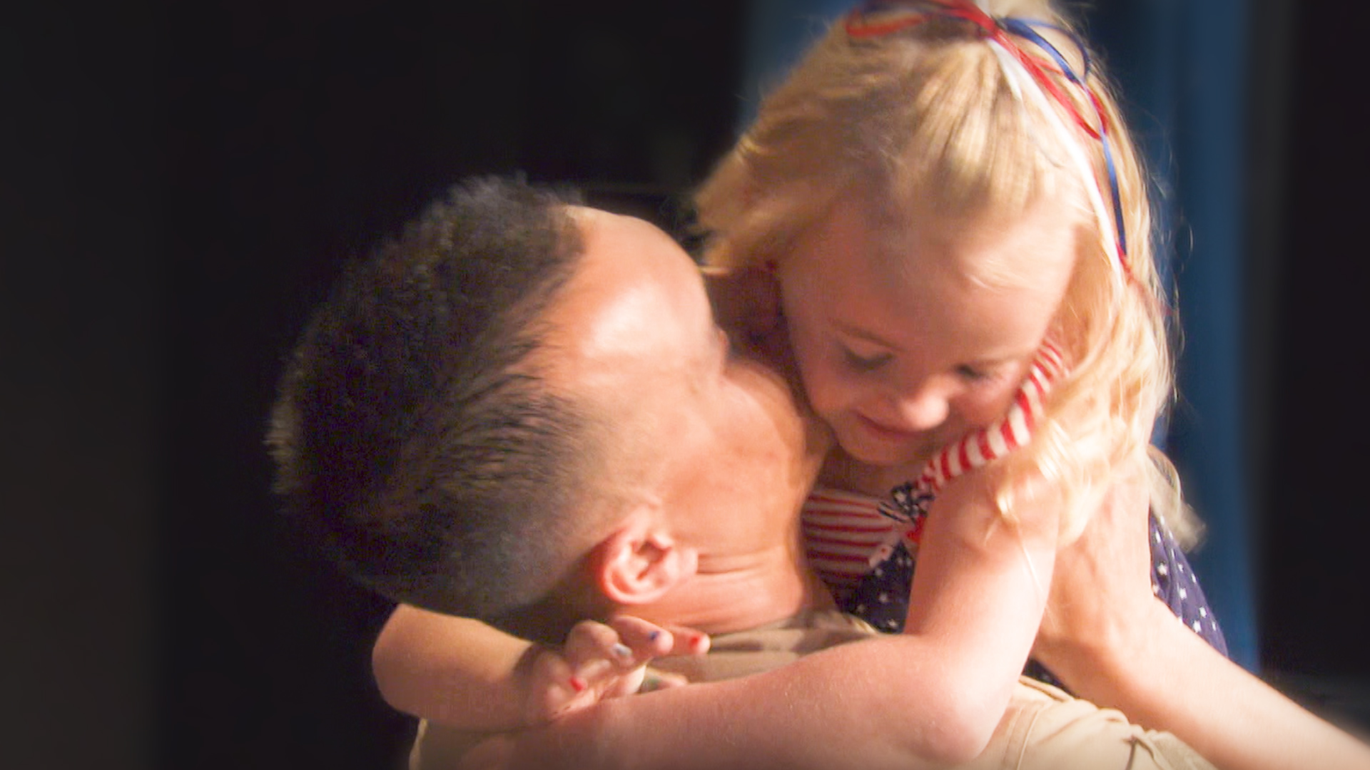 Soldier's daughter is surprised by her dad at a magic show | Coming Home