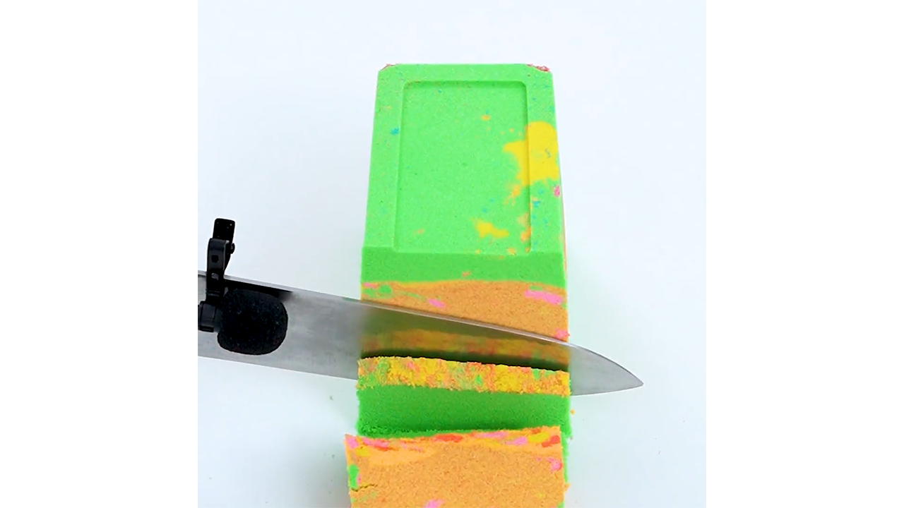 Satisfying slicing green and orange sand block with knife creating ...