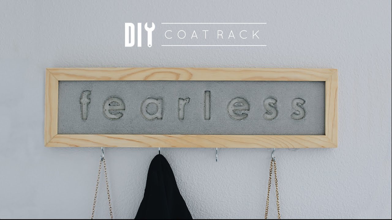 DIY wall mounted coat rack made from wood and concrete