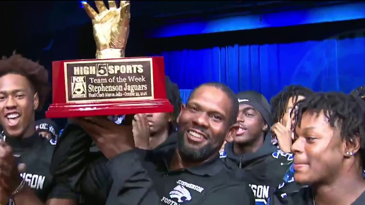 Stephenson HS Jaguars receive high 5 trophy