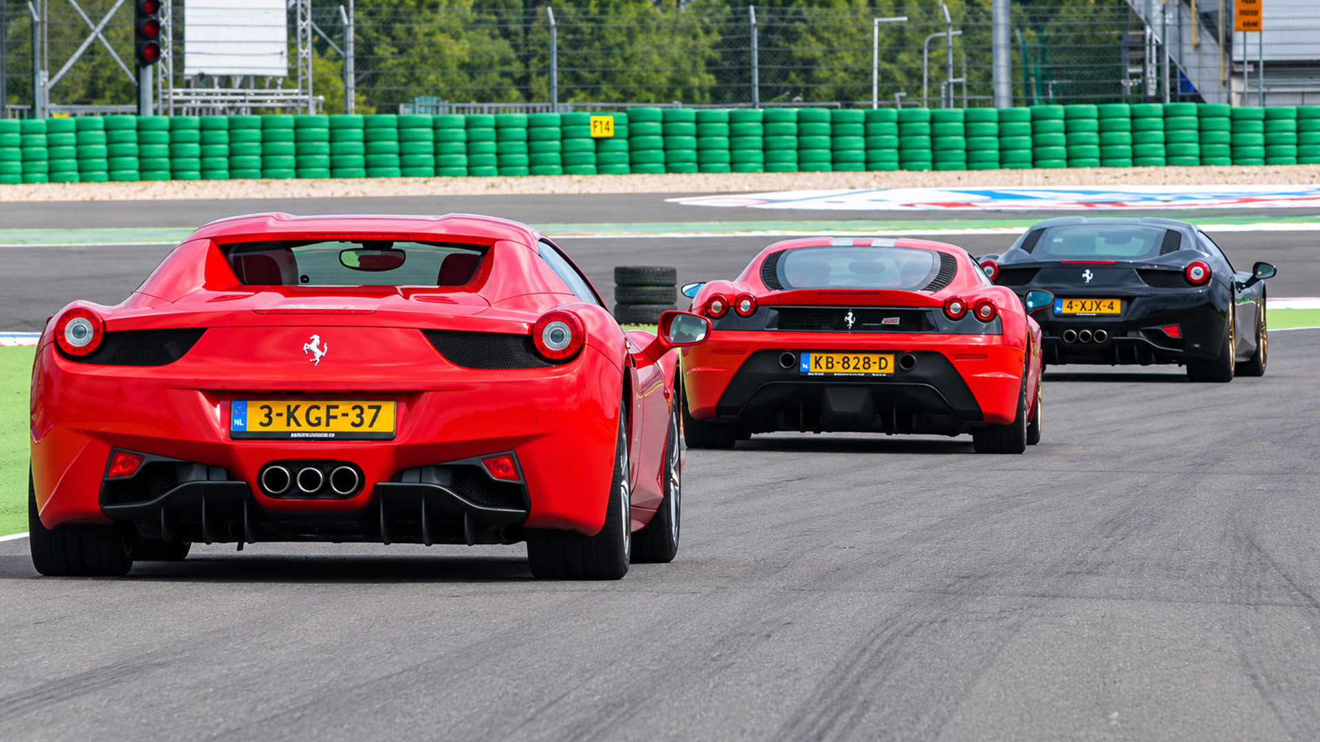 Ferrari supercars unleash their engines during Assen track day