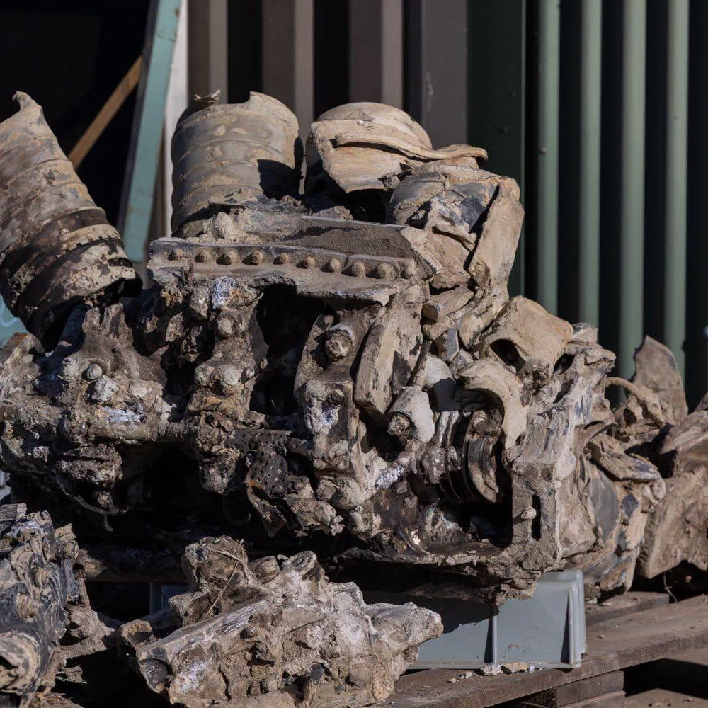 WWII fighter plane wreckage, pilot's personal items found underground