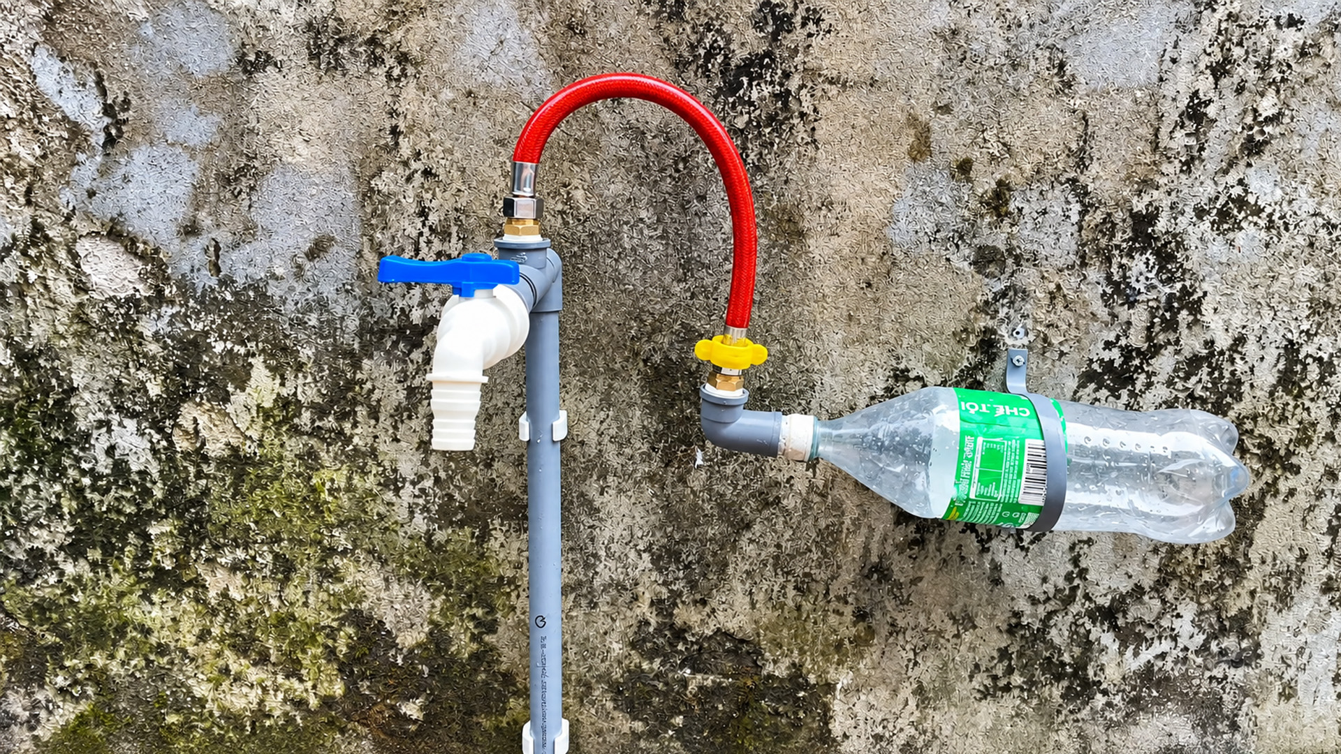 Old plastic bottle turned into a working spray nozzle