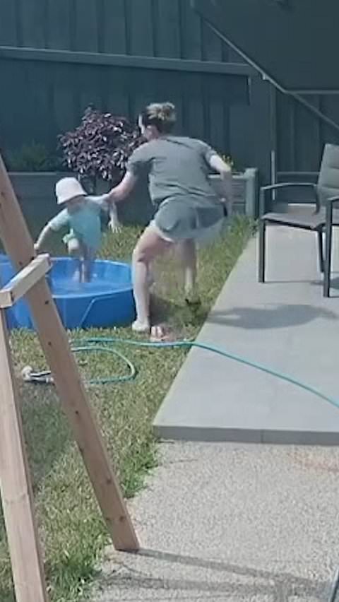 Mother protects daughter from snake