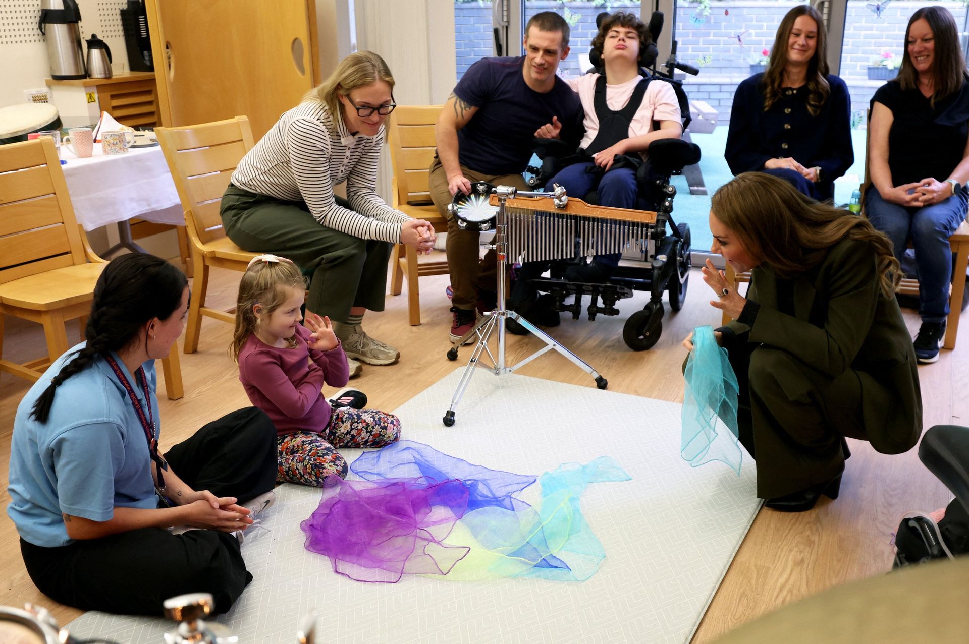 Princess Kate trades her tiara for a hard hat while visiting children's ...