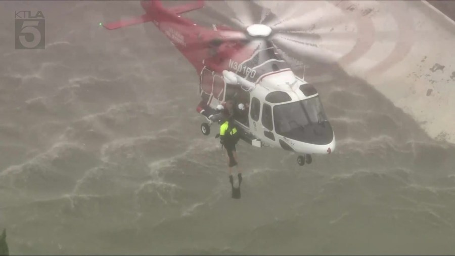 3 rescued from raging LA floodwaters; fourth escapes on their own