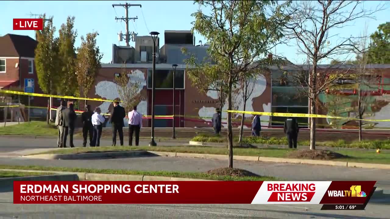 Man shot by police at East Baltimore shopping center