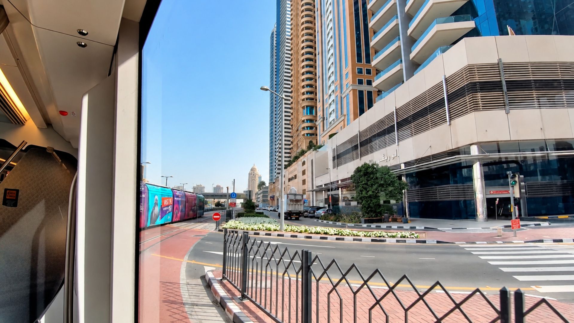 A tram ride through the high-rise streets of Dubai Marina (4K)
