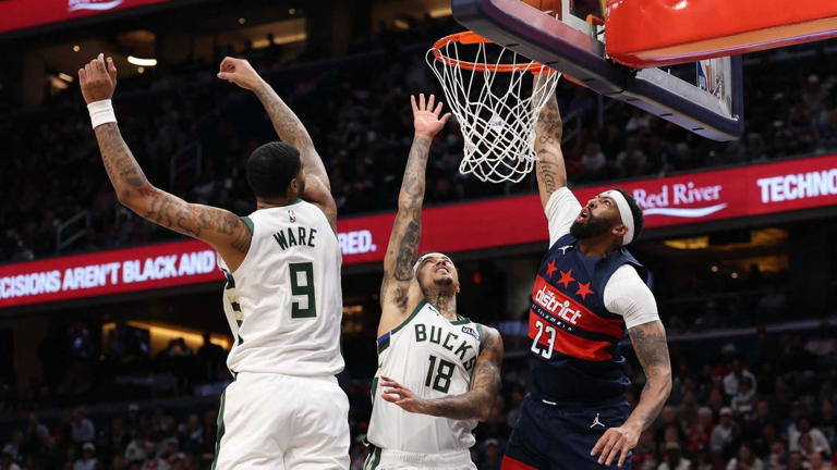 Trump aide booed out of NBA arena after throwing drink at fan in wild ...