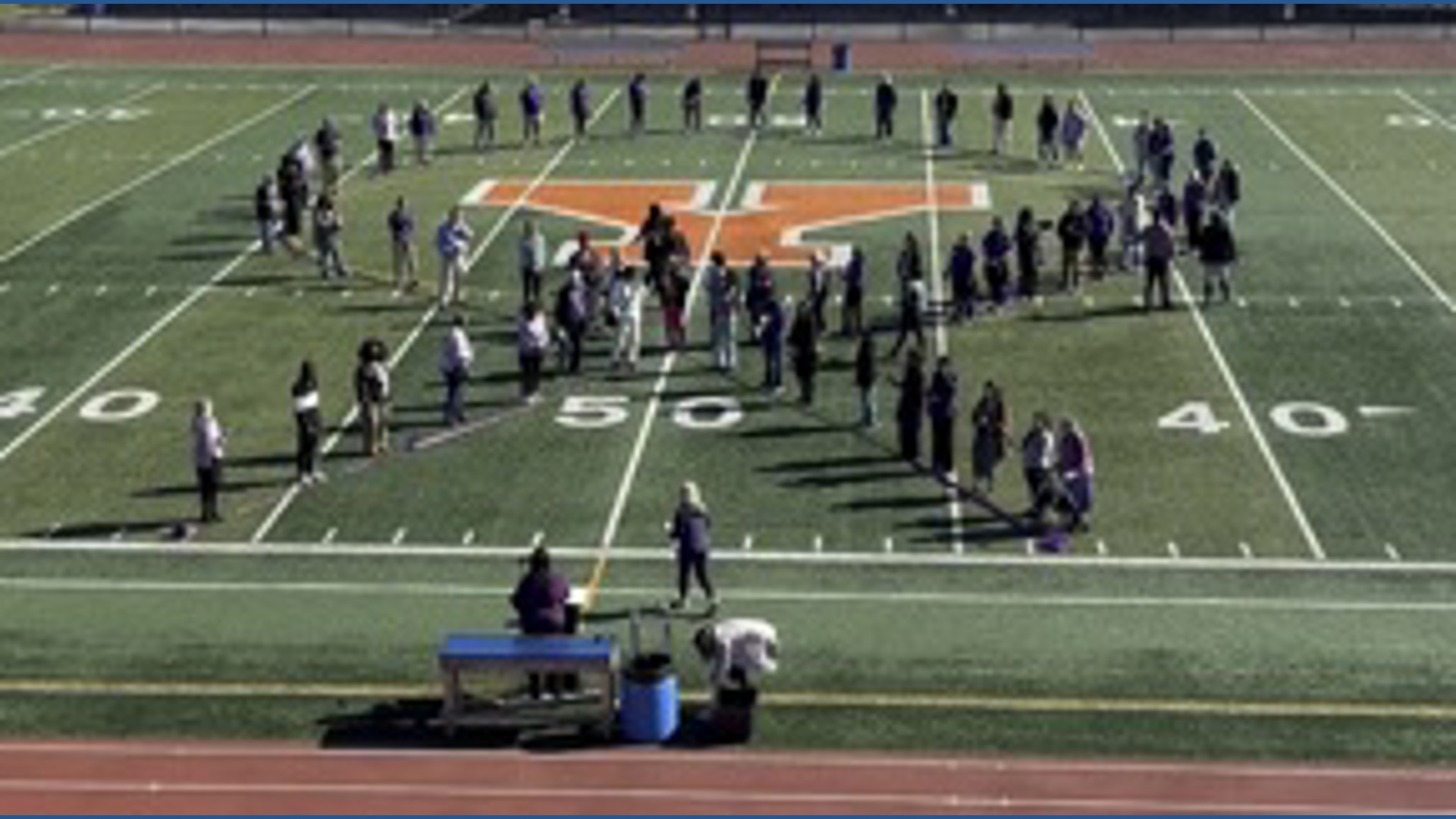 Human ribbon for Domestic Violence Awareness Month