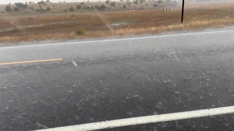 Tornado-warned supercell dumps hail in Arizona