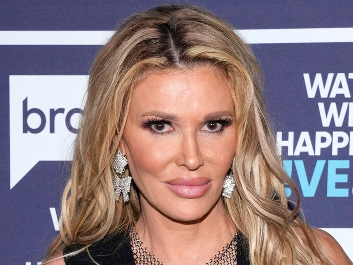 Brandi Glanville undergoing surgery to remove facial gunk and organisms
