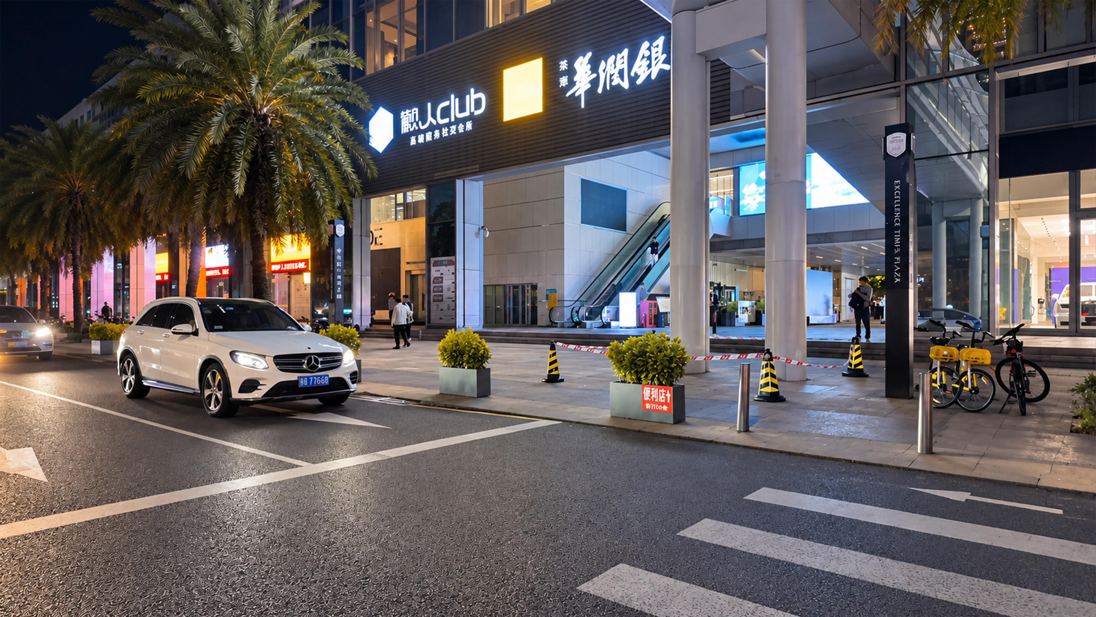 An outdoor escalator leads into Shenzhen's modern shopping complex