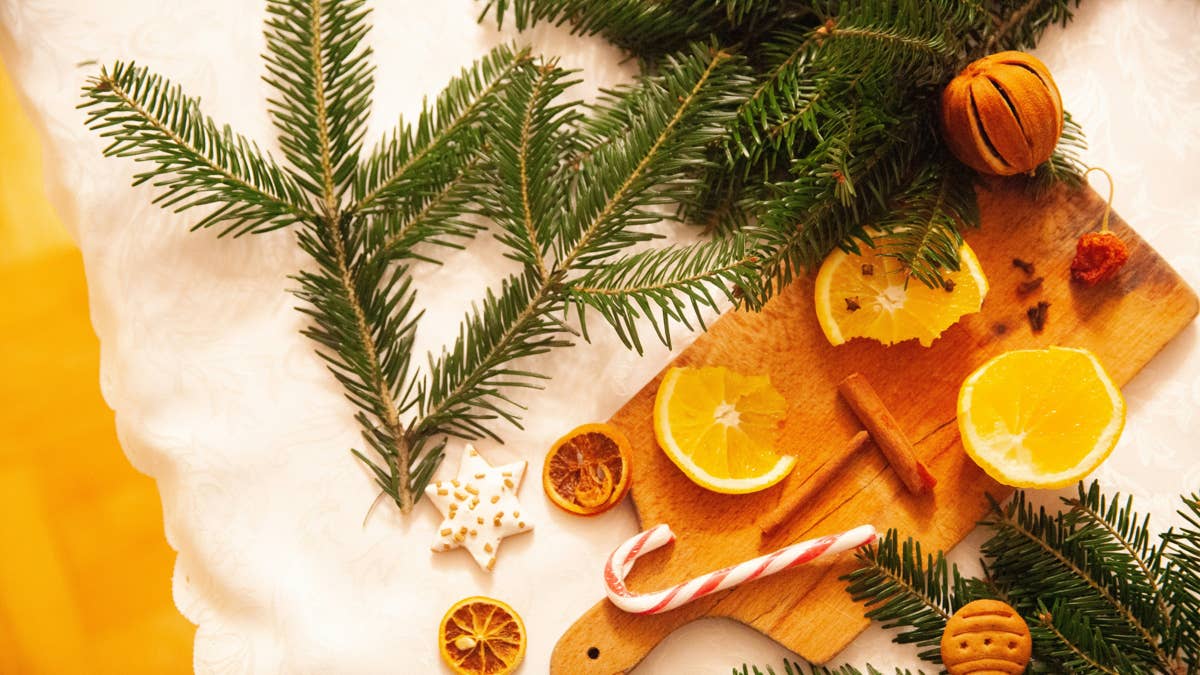 A basic wooden cutting board becomes charming Christmas decor with this ...