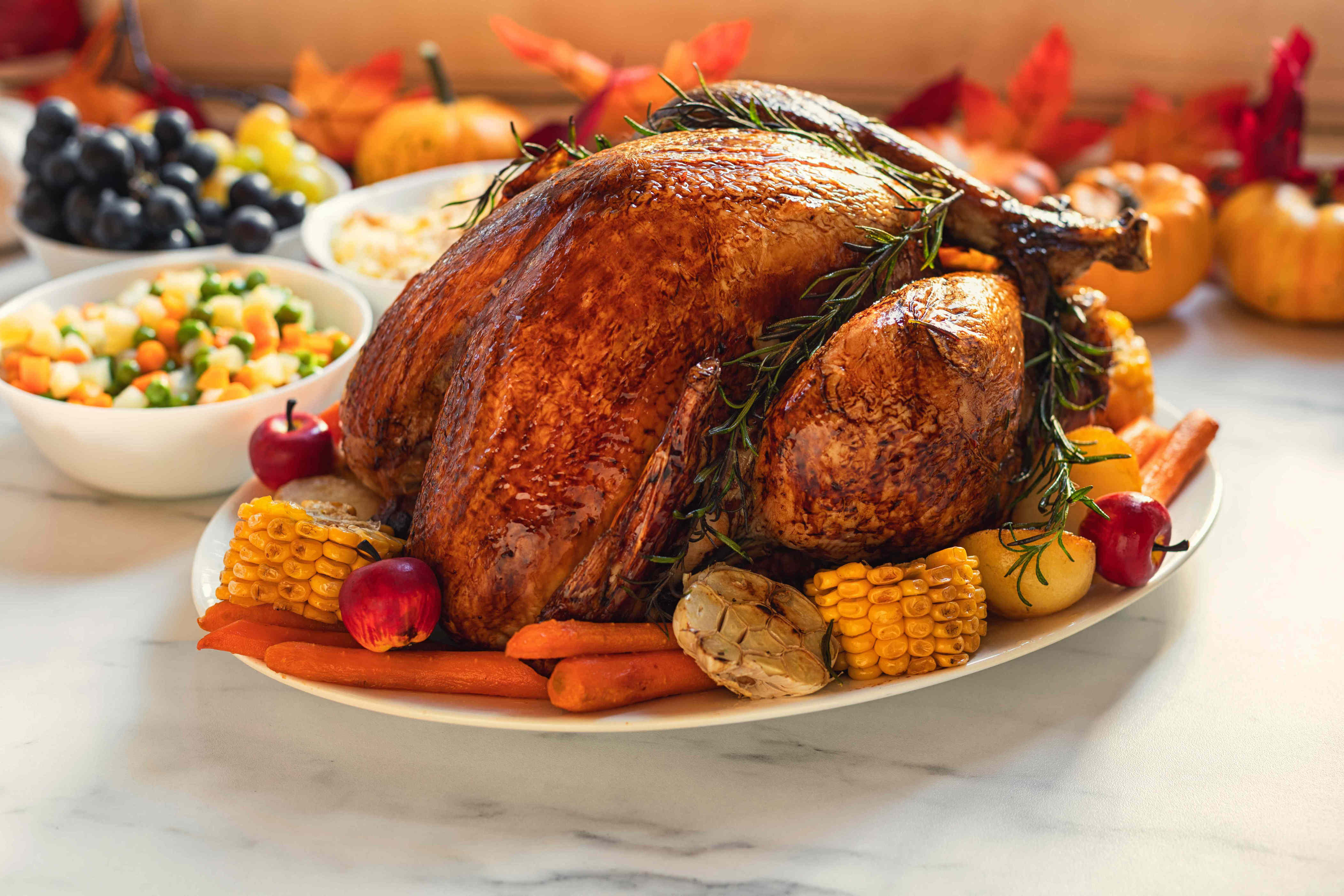 I asked 4 chefs if you should stuff your turkey before roasting it—and ...