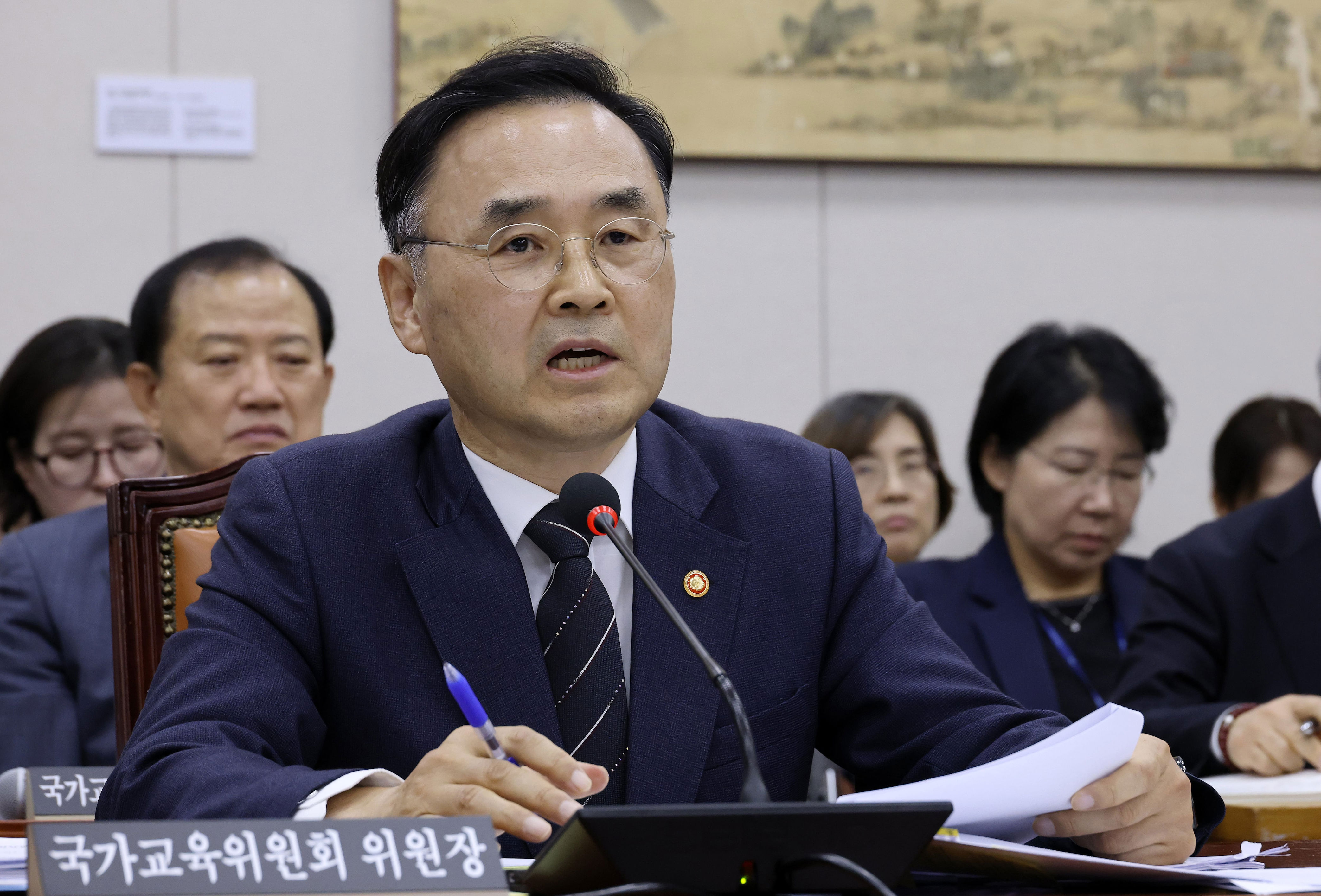 National Education Commission chief apologizes over sister’s ...