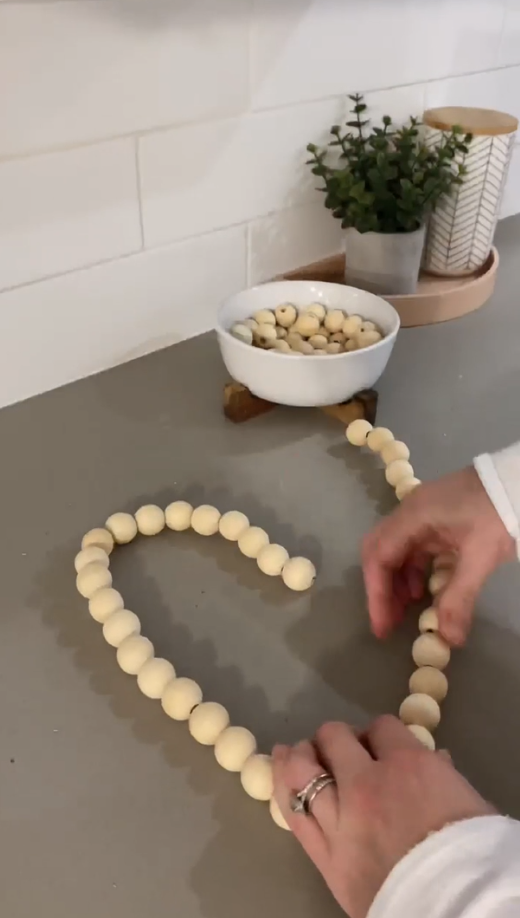Simple DIY wooden bead heart decoration