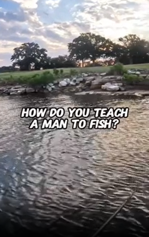 I'm trying to help him catch fish, but he won't listen!