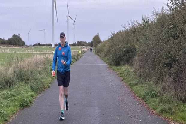 Runner to juggle entire half-marathon for £50,000 watchtower appeal