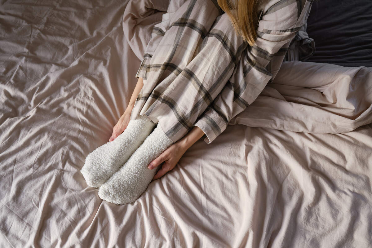 Why sleep doctors say wearing socks to bed might actually help you fall ...