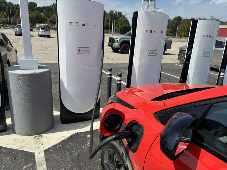 Charging at a Tesla Supercharger in Horn Lake, Miss., across from a Cybercab and a Cybertruck.