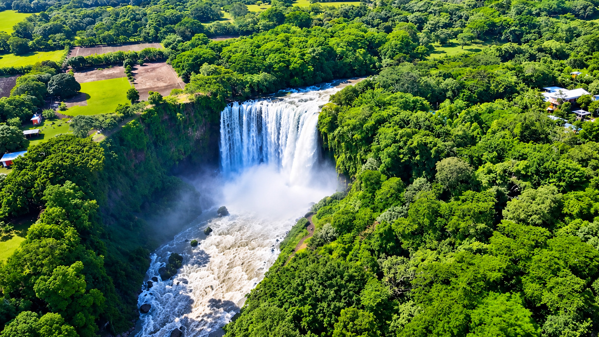 A giant waterfall drops into Veracruz's green valley