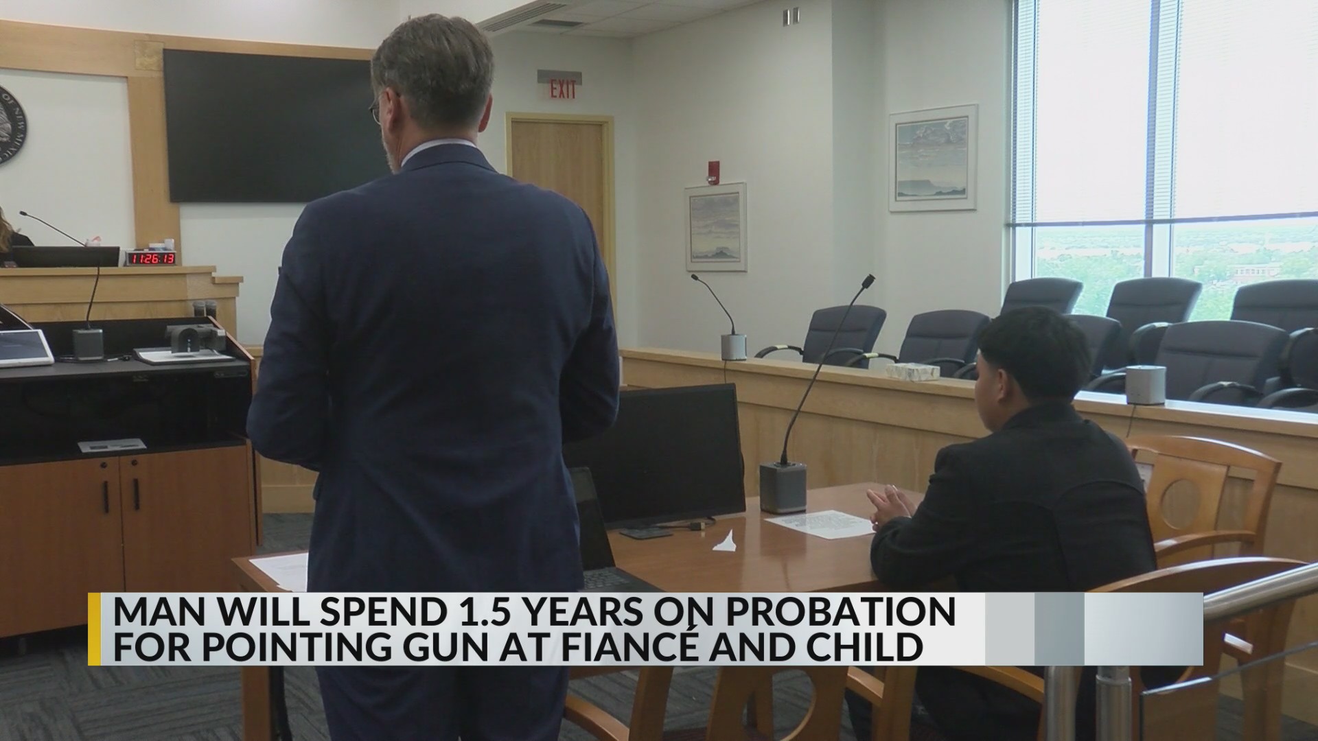 Man accused of pointing gun at fiancée, child enters plea
