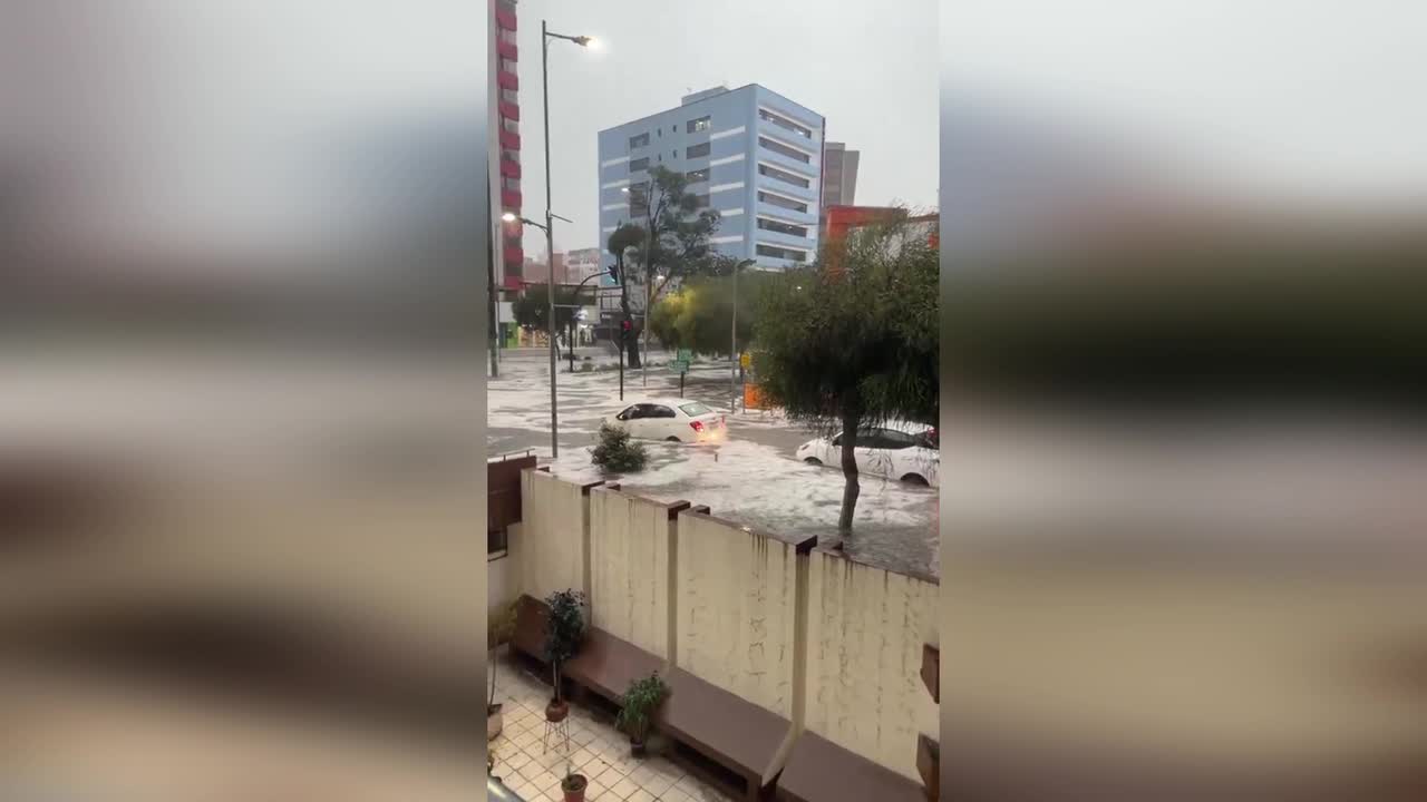 Violent hailstorm turns Quito streets into icy rivers