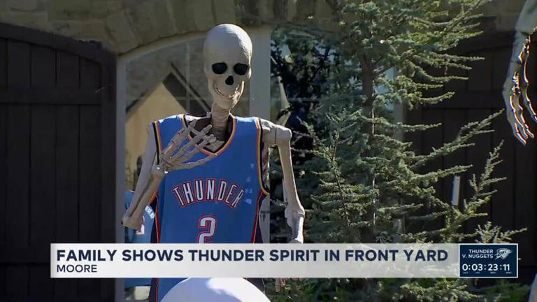 Moore family shows Thunder spirit with Halloween skeleton display