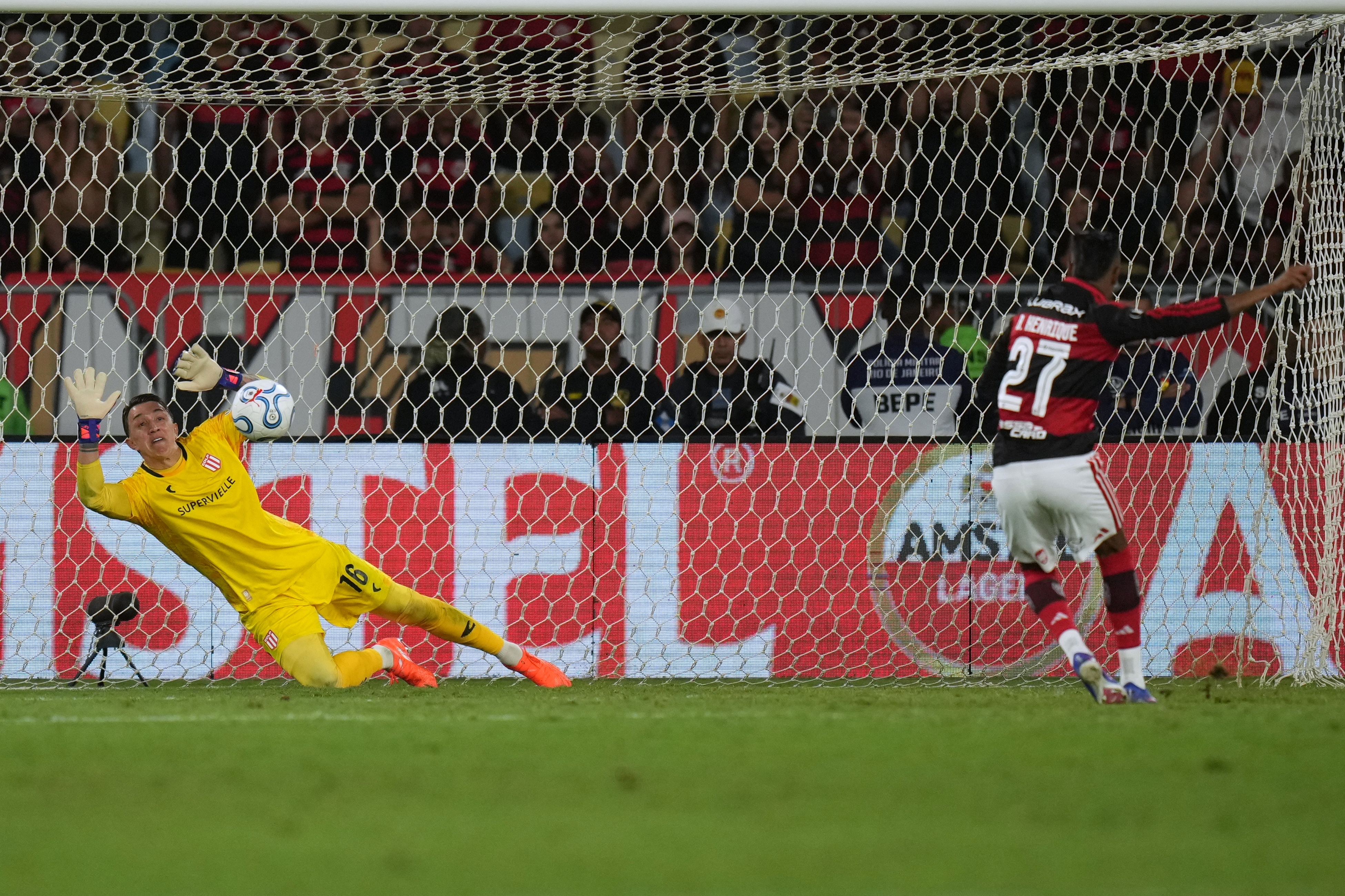 Muslera’s 3 penalty saves lift 10-man Estudiantes past Flamengo into ...