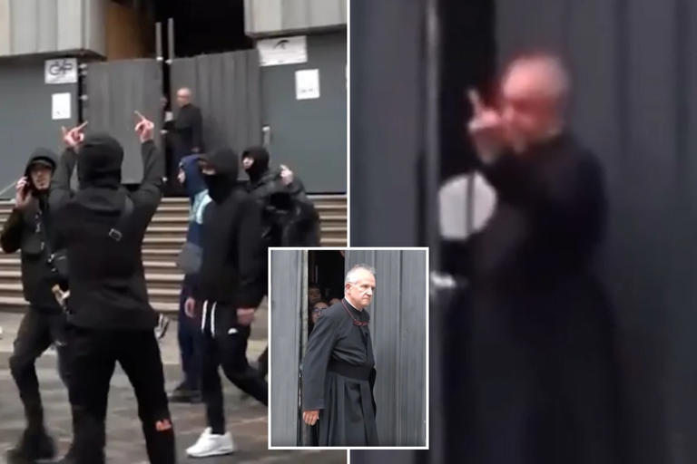 Italian priest gives middle finger to mob of masked rioters who chased ...