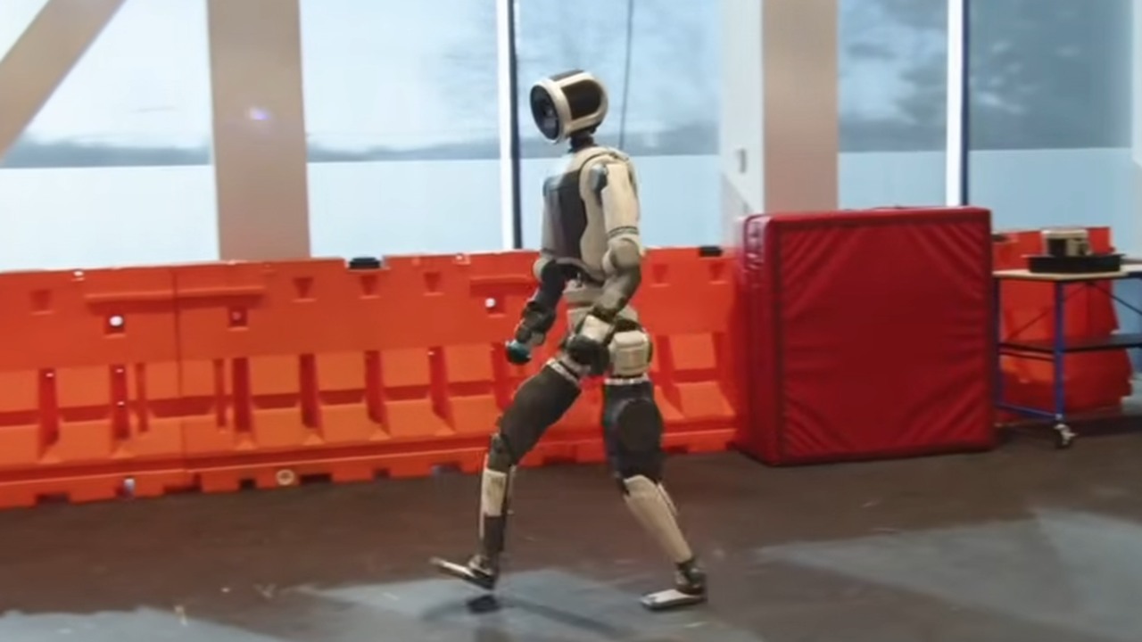Watch how a 198-pound humanoid robot uses AI to avoid falling