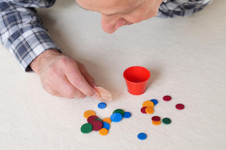 Professor retains tiddlywinks world title after nail-biting battle