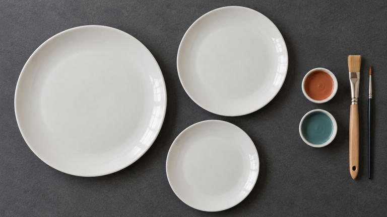 How does a small color palette bring a plate wall together?