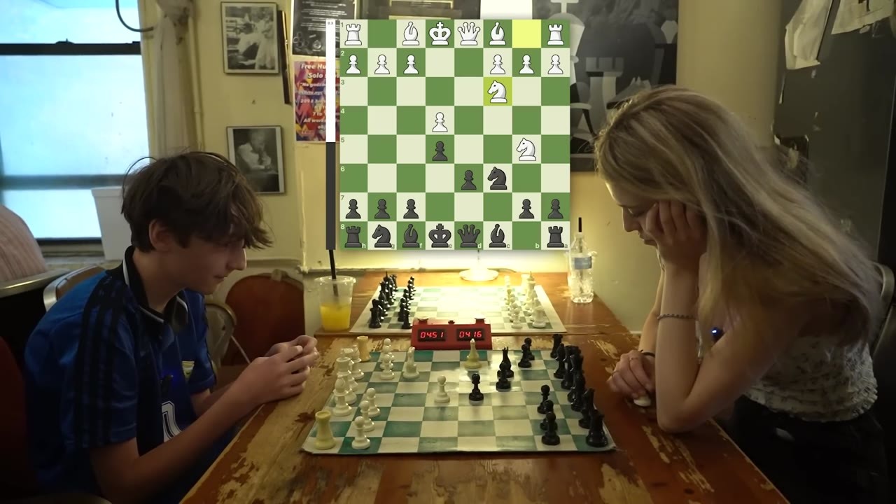 A chess match reaches game three - she pulls off a checkmate