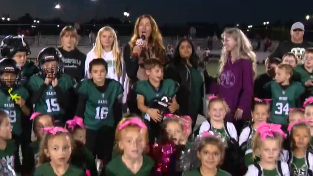 Wake up call from Marshfield youth cheerleading and football