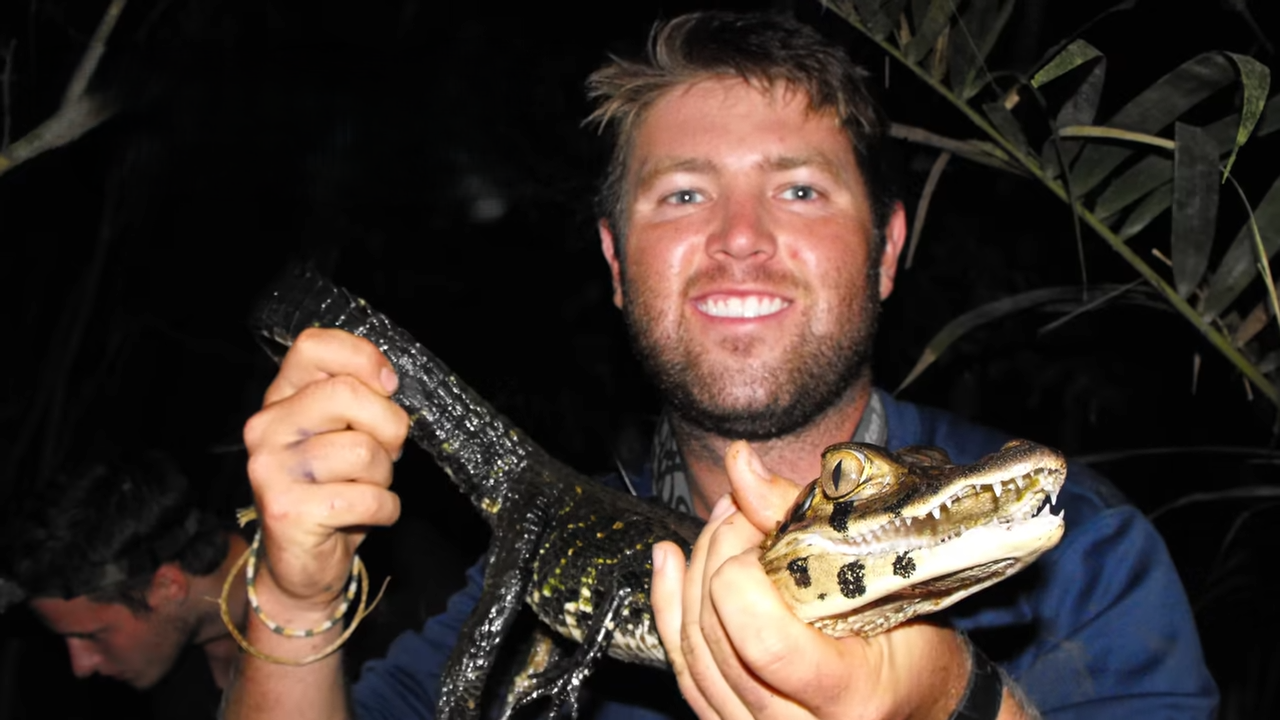 A giant caiman jumped into his canoe and everything went wrong