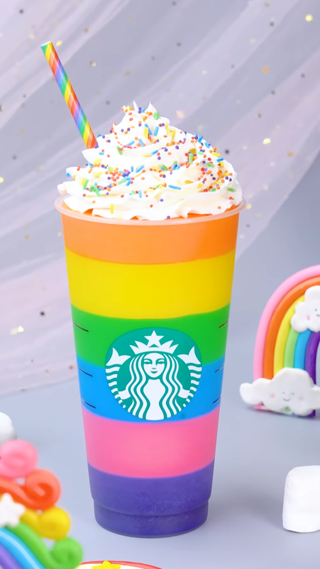 Creating a bright colorful rainbow smoothie cup dessert