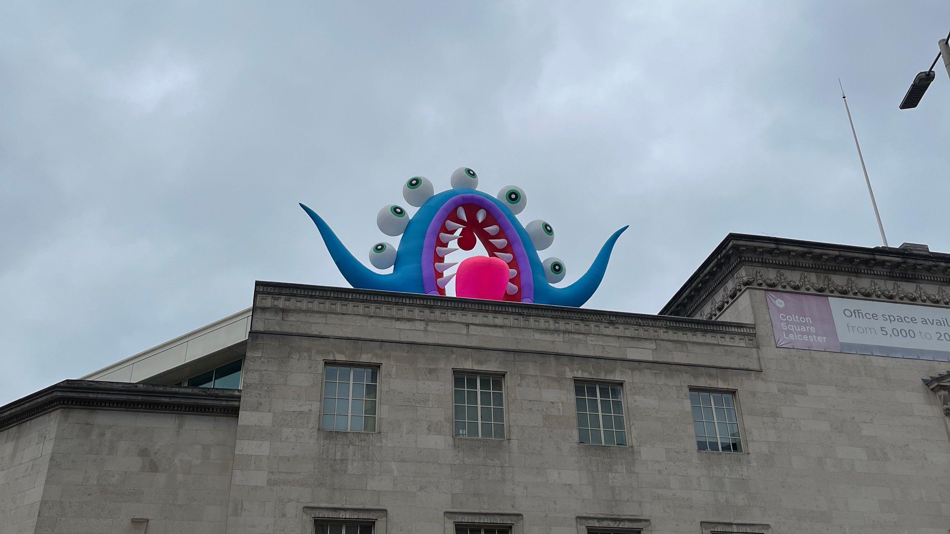 Inflatable monsters taken down due to wind