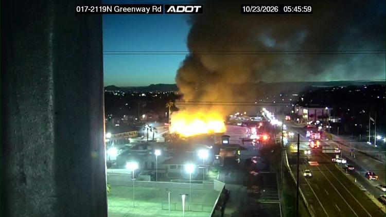 Large fire engulfs travel lodge in north Phoenix