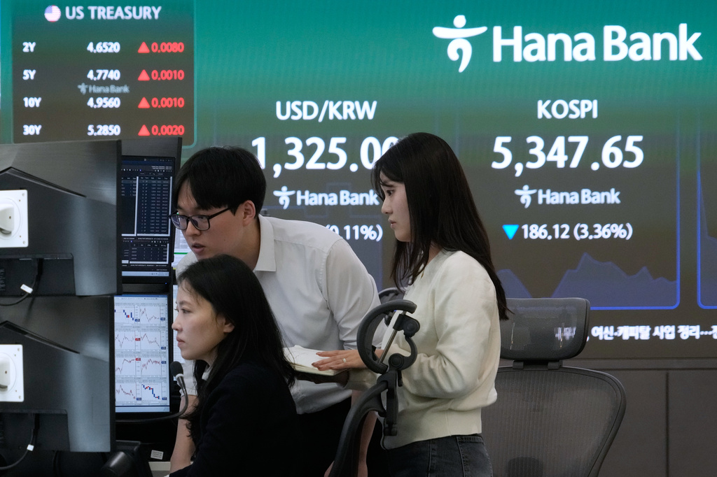 Asian shares mostly rebound from AI-related losses, while oil prices jump