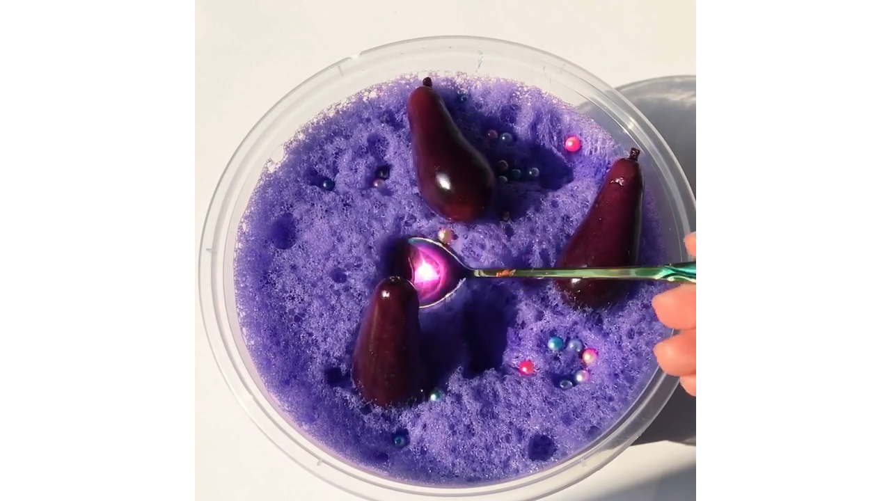 Poking purple foam slime creating satisfying bubble craters