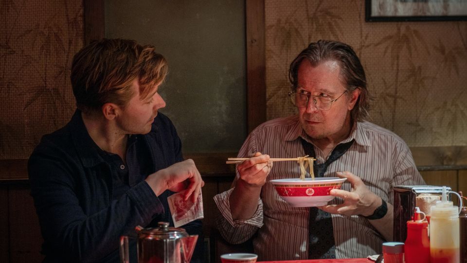 Gate Grill Cafe on Aldersgate Street, close to the Slough House office, is transformed into a Chinese restaurant in the show. In this season two scene Gary Oldman as Jackson Lamb tucks into noodles while berating Jack Lowden's River Cartwright. - Jack English/Apple TV+