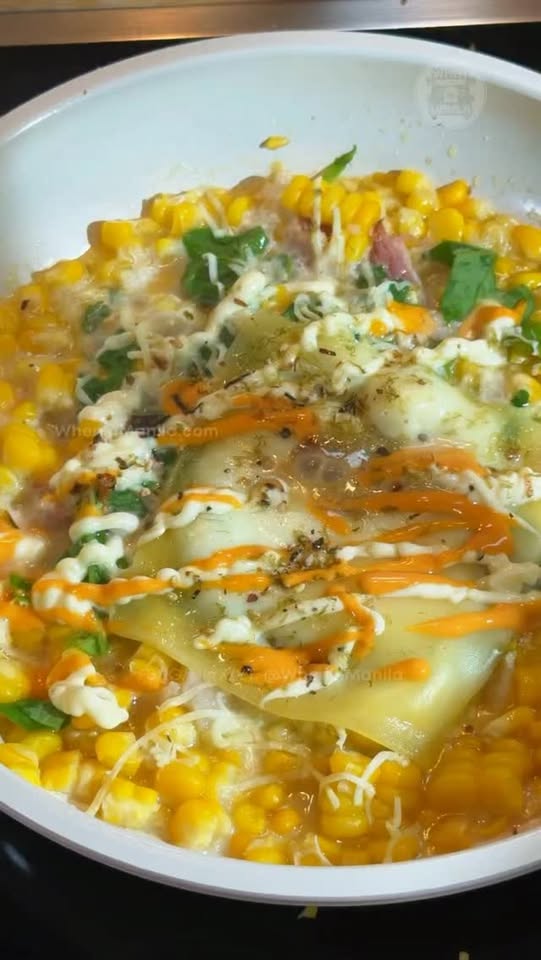 Creamed corn gets a comfort-food upgrade with bacon and spinach
