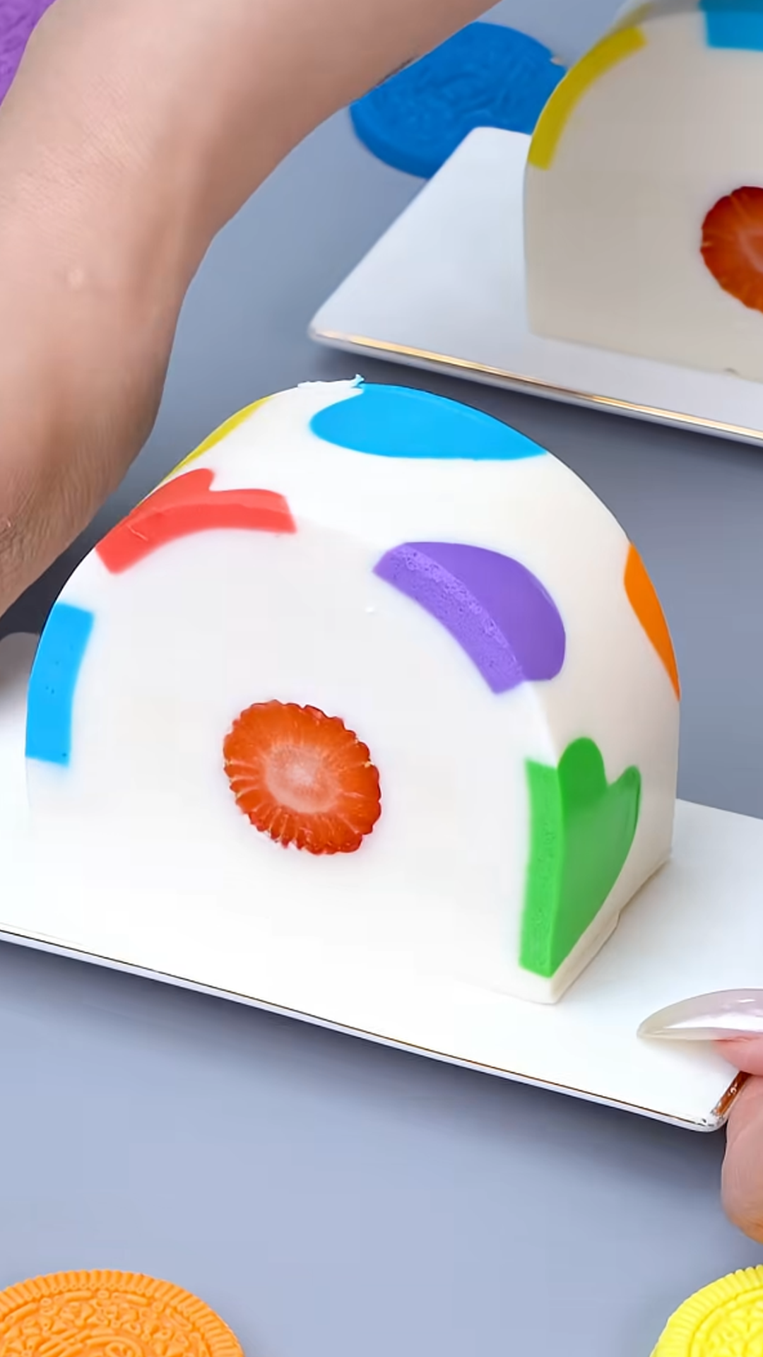 This colorful rainbow mousse cake has soft layers