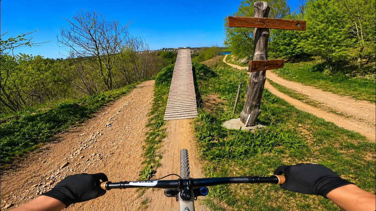 POV conquering massive dirt jumps at Sweden premier bike park