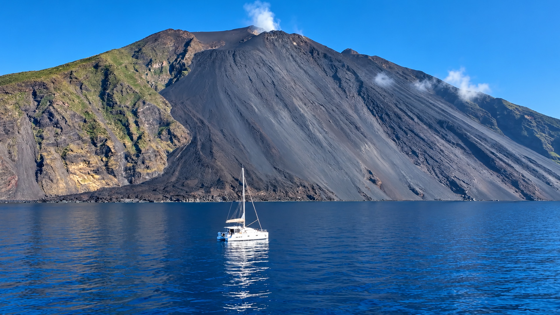 What makes this volcano look partially collapsed?