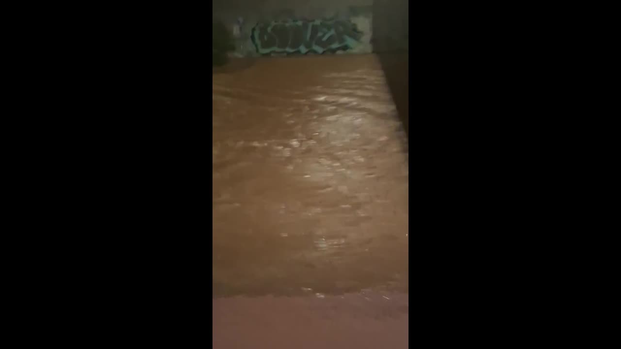 Rising floodwaters surge through Beniopa ravine as Storm Adam hits ...