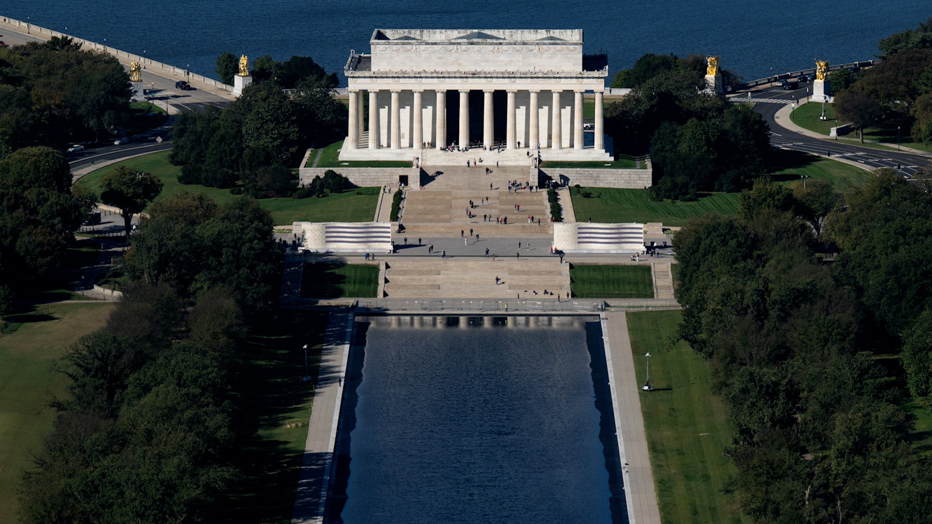 Visitors react to newly refilled reflecting pool in Washington